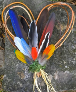 Feather Heart - ©Pat Tuholske - Arcs of Willow, Birch and Sycamore Twigs with Turkey, Geese, Duck and other feathers nestled in Lichen - 11” x 14” - $52