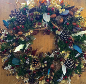 Woodland Wreath - ©Pat Tuholske - Wild Flowers and Grasses, Moss, Acorns, Feathers, Ferns, Leaves, Rose Hips, Sumac Berries, Spruce and Pine Cones - 15” diameter - $85