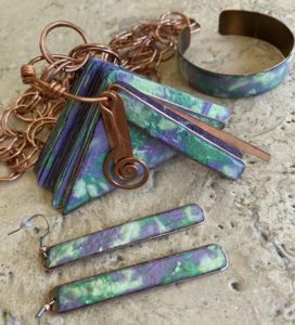 Happiness in Greens and Violets - ©Lois Jacobs - handmade paper and copper - 1.75 x 3.25 $275