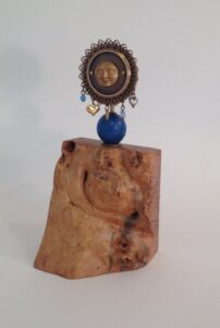 Nell’s Belles Nurture - ©Nell Kobes – Brass -African Powder Glass Bead – Charms -Birdseye Maple Sculpture -
3 x 3 x 7 inches - $105