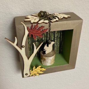Squirreling Dervish - © Nell Kobes – Wood - Paint - Brass Charms -Stamped Paper -
4 x 5 x 2 inches - $95