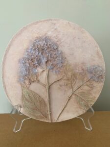 Periwinkle Present - ©Catherine Myre - Plaster Bas Relief - 9 inches diameter - $95