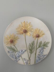 Summertime-©Catherine
 Myre - Plaster Bas Relief - 7 inches -diameter -$55