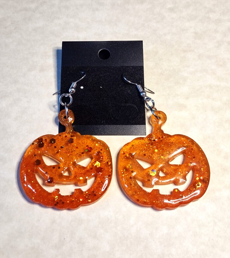 Part # 14721069 Resin Pumpkin Earrings Price $19.97 (1)